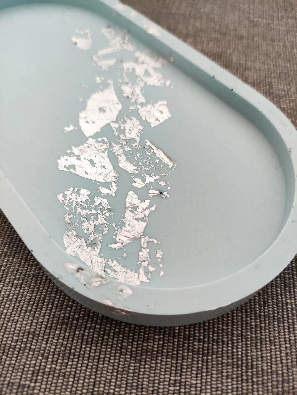 Baby blue oval catch all tray with silver flakes